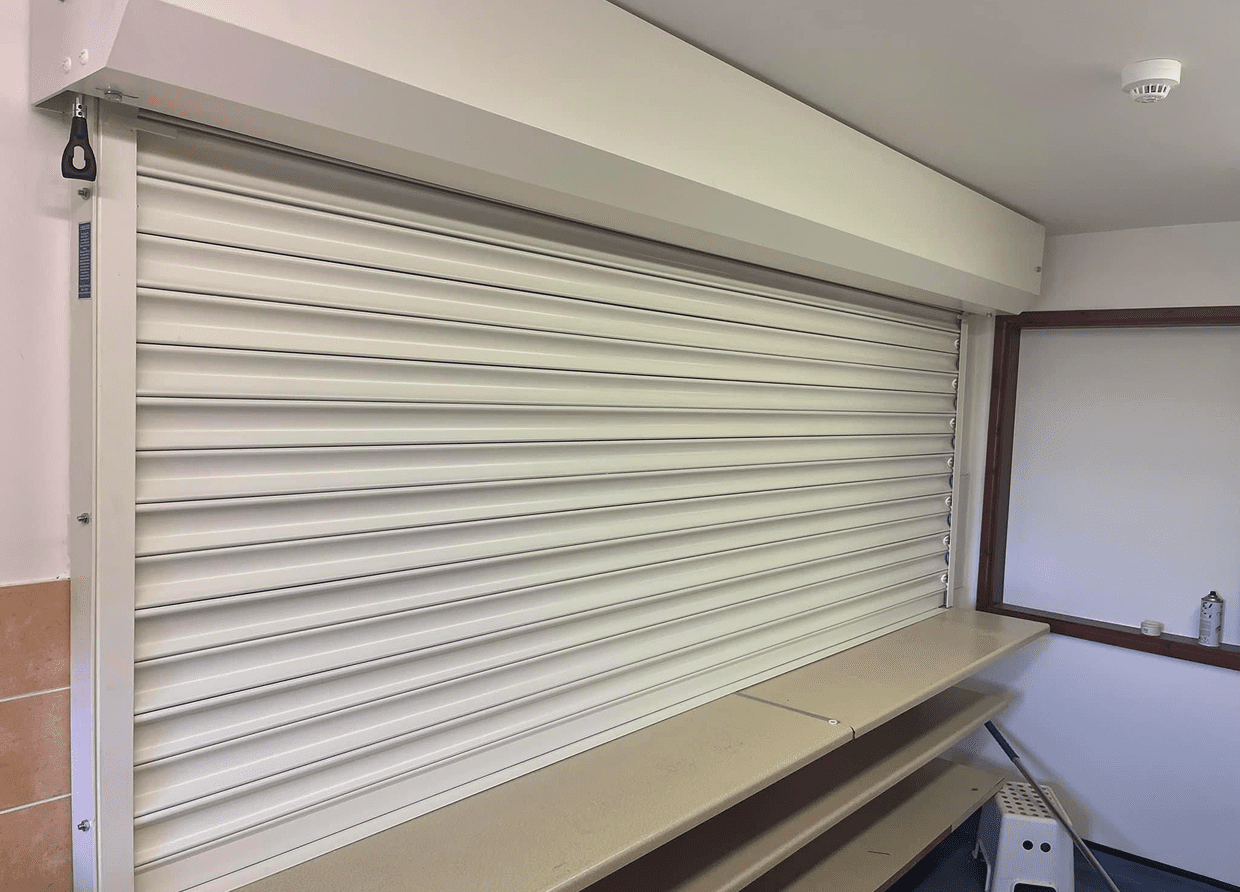 Indoor counter with a roller shutter.
